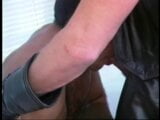 Stud in leather gear sucks his partner's dick on his knees snapshot 13