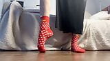 beautiful legs in socks dancing on the floor snapshot 2