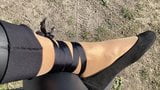 Crossdresser in leather leggings & shiny multilayered nylons snapshot 1