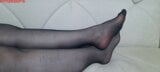 From another point of view, Anna's black pantyhose, legs and feet. snapshot 8