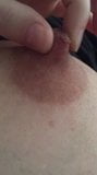 Playing with my nipple up close snapshot 4