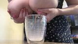 Big tits filling cup with milk snapshot 8