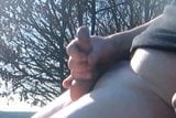 jerk and cum on parkbench outdoors in public snapshot 4