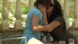 Two MILFs on a carpet next to a pool pissing & licking snapshot 3