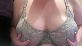 Boobs falling out of grey bra snapshot 1