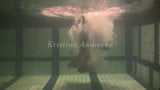 Brunette teen Kristina Andreeva swims naked in the pool snapshot 1