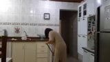 Rotin Woman in kitchen snapshot 1