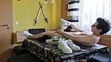 Young boy having fun at the dining table with sneakers snapshot 8