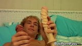 Handsome twink shoves a giant dildo up his rear and cums snapshot 10