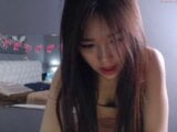 Sweet Japanese webcam model likes naked masturbation on cam snapshot 6