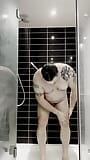 Chubby Tattooed Guy Showering snapshot 6