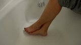 TSM - Dylan Rose plays with water using her feet snapshot 3