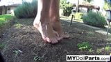 Kayla takes a barefoot walk around her backayard snapshot 10