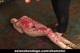 Kinky Asian slavegirl gets drenched in molten wax snapshot 10