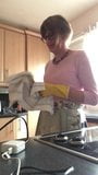 Rose 1950's housewife washes the dishes snapshot 13