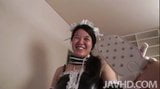 Eri Yoshino dressed up as a maid uses a whip and paddle on a snapshot 2