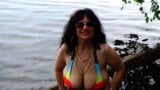 38DD Mature Busts Out Of A Beer Bikini snapshot 13