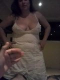 White dress, deep cleavage snapshot 1