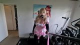 Pink Goth Maid in chastity riding a dildo on public balcony snapshot 2