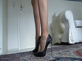 Perfect legs and high heels show snapshot 5