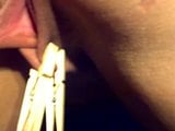 sluT being used with clothes pins and riding crop snapshot 15