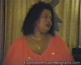 Big fat African woman shows massive tits in hot striptease snapshot 2