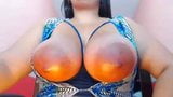 Chubby Latina shows big boobs and huge oily areolas on cam snapshot 5