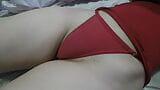 She lays in her tight red panties on her puffy pussy and I squeeze her hairy Cameltoe until she takes her panties off snapshot 1