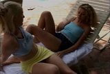 Two blondes have sex by the pool snapshot 4