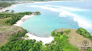 Putri Cinta stripping on a beautiful tropical beach snapshot 1