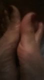 My hot babe giving me a footjob snapshot 4