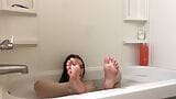 young girl showing off her feet while naked in the bathtub emodream1998 many vids ,com snapshot 13