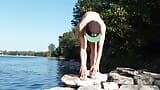 Gay twink does naked yoga outside on a rocky beach, gay cruising men passing by might watch him  Naked Asian boy doing yoga outd snapshot 9