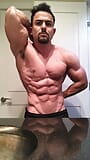 Jacked bodybuilder Benji Bastian flexing his huge, shredded, muscles snapshot 6