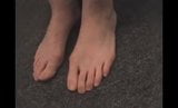 Older woman showing feet snapshot 1