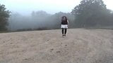 Sandy undresses on dirt road snapshot 2