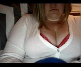 Chubby blonde plays with chubby tits on snapshot 1