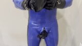 Shiny blue rubber gimp cumshot snapshot 5