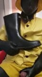 yellow rain gear and rubber boots snapshot 8