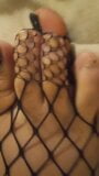 Unpedicured feet in fishnets snapshot 12