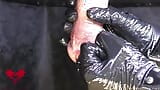 Milking table closeup: The mistress massages the sperm out of the cock with latex gloves. snapshot 4