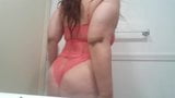 Ginger Paris masturbándose en sexy lencería naranja de neón snapshot 4