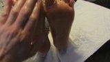 Oiling her soles and toes snapshot 2