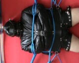 Straitjacketed slave is restrained to the Frame snapshot 12