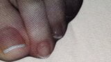 Black nylon sock on Wife's french toenails in detail covered by big cum load snapshot 2