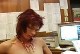 Horny German secretary pleasing herself in the office snapshot 5