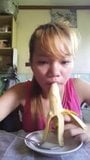 Filipina Bea sucks banana and cream snapshot 6