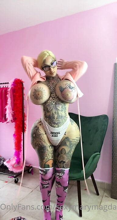 Solo tattoo stripper big fake boobs tease