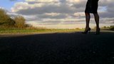 Walking in black patent hells fishnets and black tight skirt snapshot 4