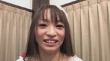 Funky Japanese babe chats to the camera in an interview snapshot 9